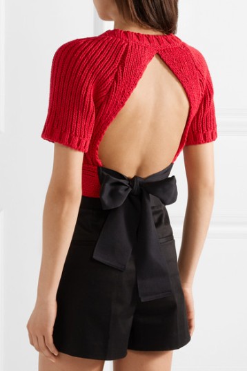 Open-back knitted top with ribbon tie. REDValentino Cropped Tie-back Ribbed Votton Sweater (from net-a-porter)