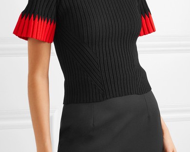 Alexander McQueen black, rib knitted top with flared short sleeves with contrast red edging.