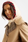 Cream, knitted snood with navy and red braided edging, by Gucci.