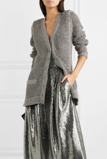 Model wearing Marc Jacobs long, oversized cardigan with allover lace mesh detail – worn with metallic silver trousers